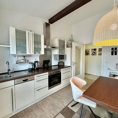 Апартаменты Kleines Penthouse - Fewo-badhindelang Зонтхофен